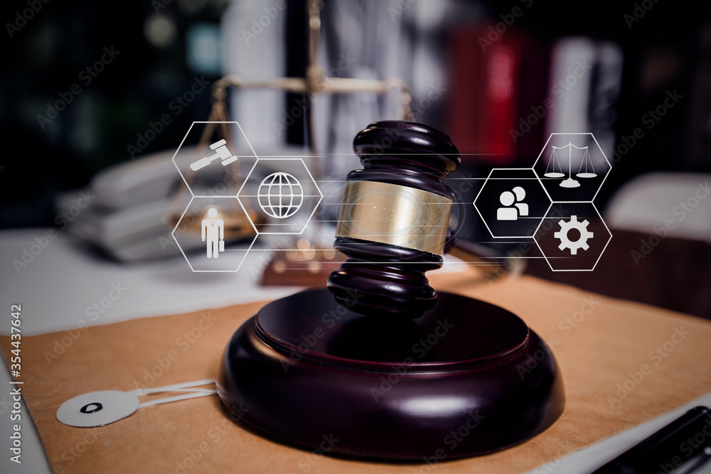 Wooden gavel with scales of justice and lawyer businessman working law in office workplace for consultant lawyer concept. Wooden gavel with scales of justice and lawyer businessman working law in office workplace for consultant lawyer concept.
