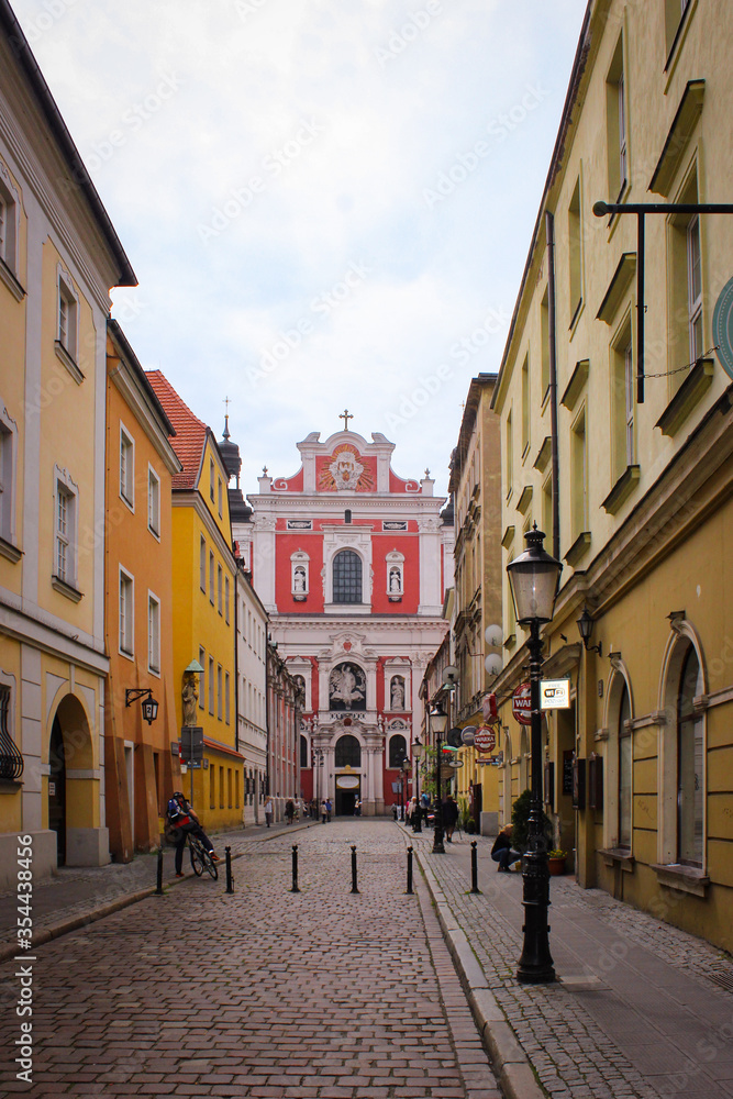 Poznan, Poland - May 05, 2015: Old Town Street Near Fara Poznanska Baroque Parish And Collegiate Church