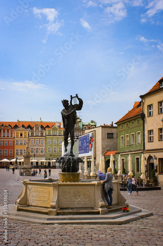 Poznan, Poland - May 05, 2015: People Walk In The Central Square Of The Old Town Near The Town Hall