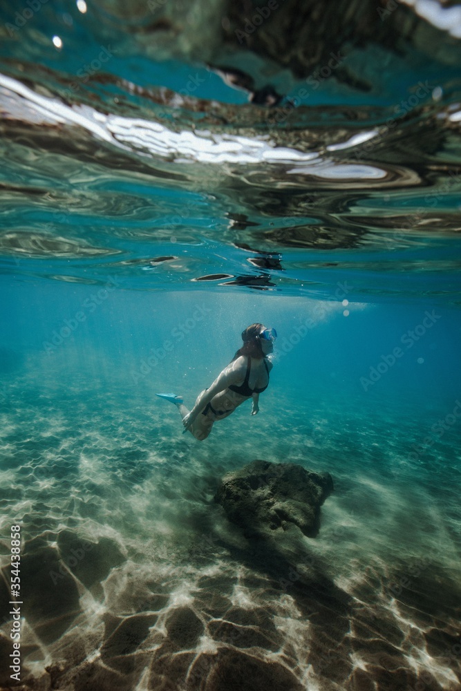 Girl swiming underwater