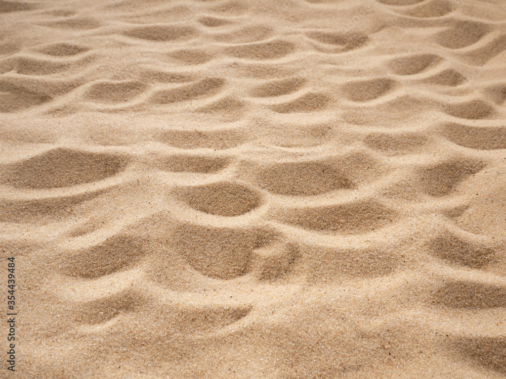 Fototapeta premium Loose sand is beige. Background for your design