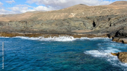 where the land meets the sea and forms paradise