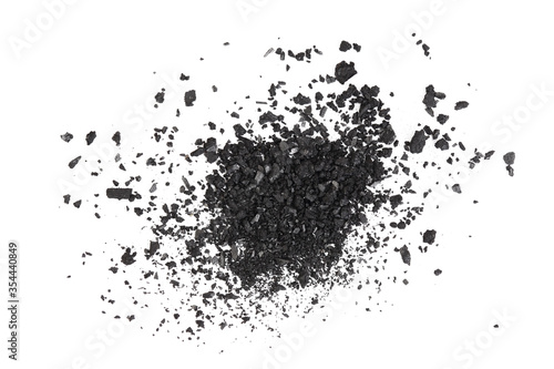 Pile of coal carbon or charcoal dust isolated on white background