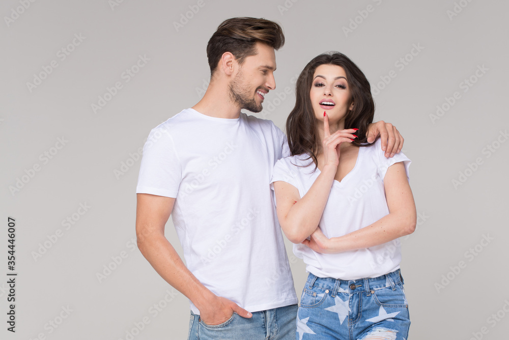 Naklejka premium Happy summer cute couple wearing blue jeans