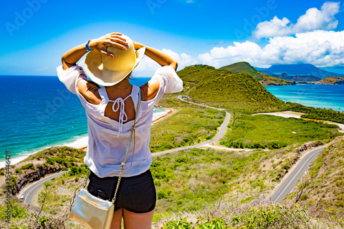 Woman Looking at St. kitts & Nevis view from the Timothy Hill.  photo
