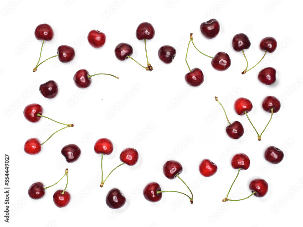 Fresh cherries isolated on white background. Knolling concept with copy space. Fresh cherries isolated on white background. Knolling concept with copy space.