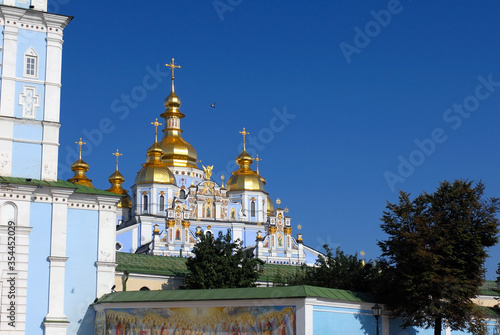 Fotografie Church with blue walls and gold dooms