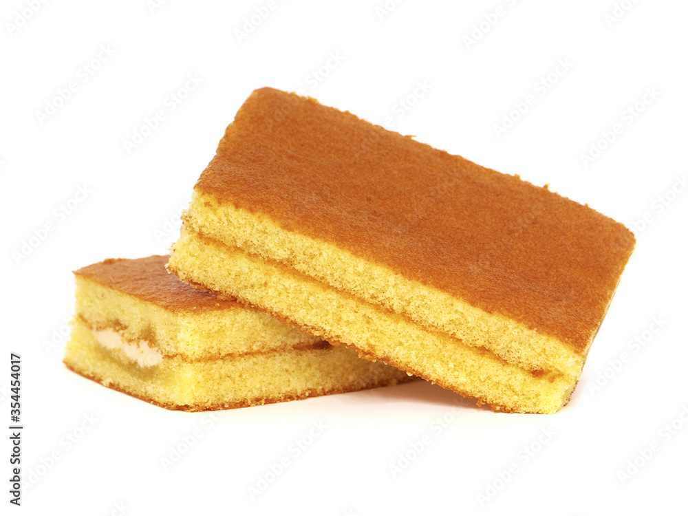 Sponge Cake with fruit cream filling isolated on white Sponge Cake with fruit cream filling isolated on white