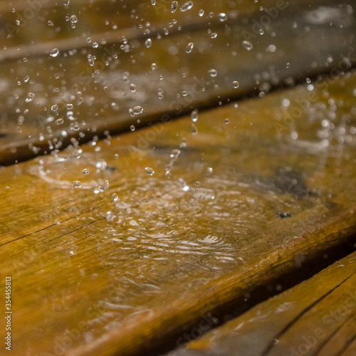 water drops on wooden surface
