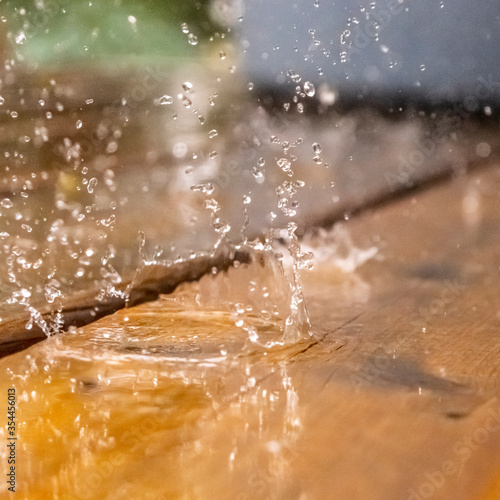 water drops on wooden surface