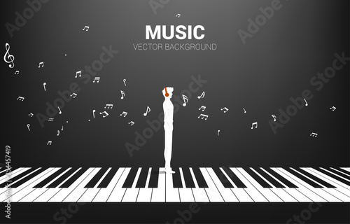 Vector silhouette of man standing with piano key with flying music note . Concept background piano music and recreation.