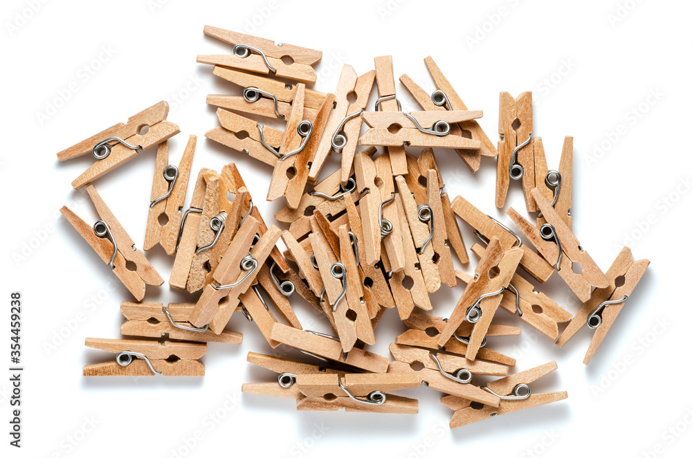 Top View of Pile of Wooden Clothespins Isolated on White Background Top View of Pile of Wooden Clothespins Isolated on White Background