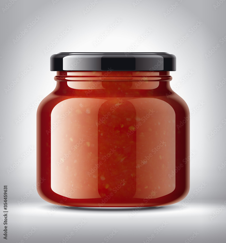 Glass Jar on Background with Tomato Sauce Glass Jar on Background with Tomato Sauce