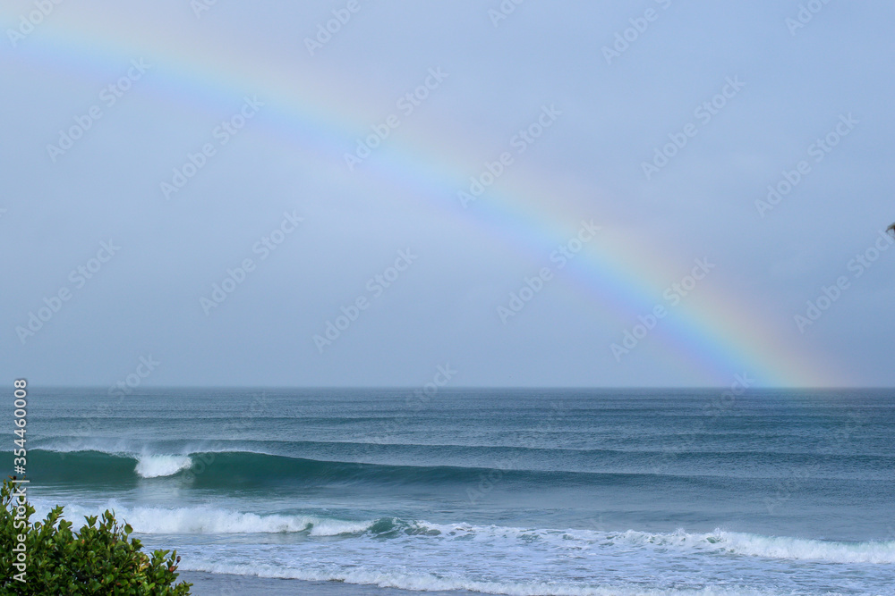 Waves breaking in Japan. The Pacific Ocean & its waves often generated by a Typhoon. The stunning coastline of Japan, Travellers like to visit the beach & watch the swell turn into waves & break Waves breaking in Japan. The Pacific Ocean & its waves often generated by a Typhoon. The stunning coastline of Japan, Travellers like to visit the beach & watch the swell turn into waves & break