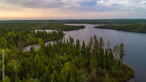 Drone photo over the northern Boreal Forest at sunrise 
