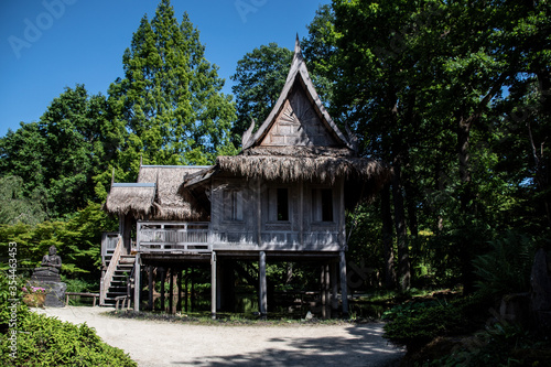 Arcen, The Netherlands - 28.5.2020 - Traditional asian stilt house in the castle park Kasteeltuinen