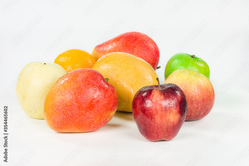 red Apple and mango isolated on a white background. fruit. red Apple and mango isolated on a white background. fruit.