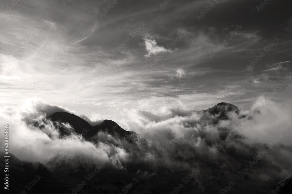 The Andes mountain range towering above the clouds. The Andes mountain range towering above the clouds.