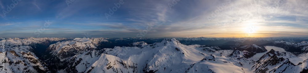 Aerial Panoramic View of Canadian Mountain Landscape during a colorful sunset. Located near Squamish, North of Vancouver, British Columbia, Canada. Nature Background Panorama