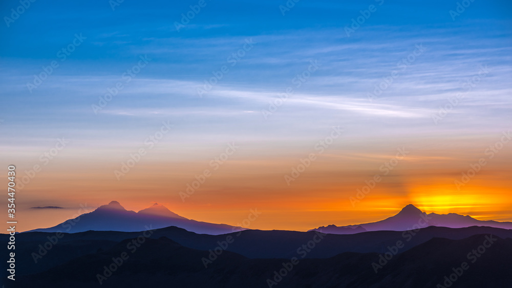Sunset at the Ilinizas volcanoes in Quito, Ecuador