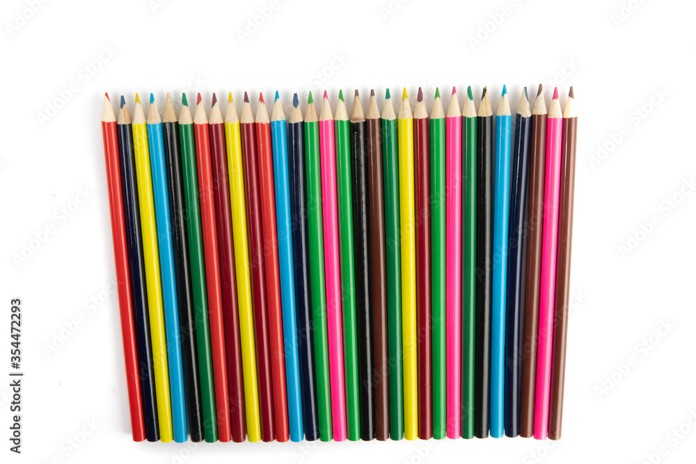 a row of colored pencils in perspective view isolated on white a row of colored pencils in perspective view isolated on white