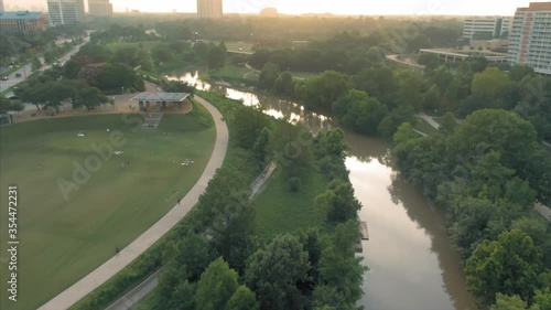 Aerial: Buffalo Bayou Park and traffic at sunset. Texas, USA photo