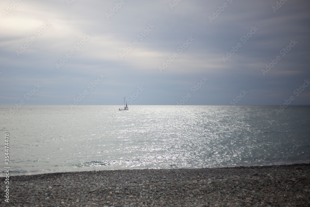 The yacht is far from the coast. The yacht is far from the coast.