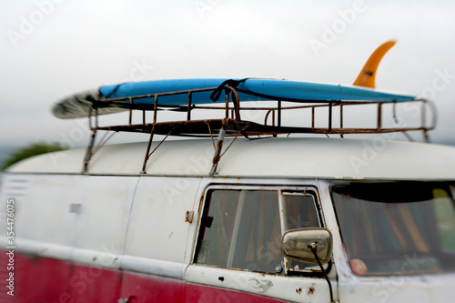 Surfboard on top of a Microbus, California 