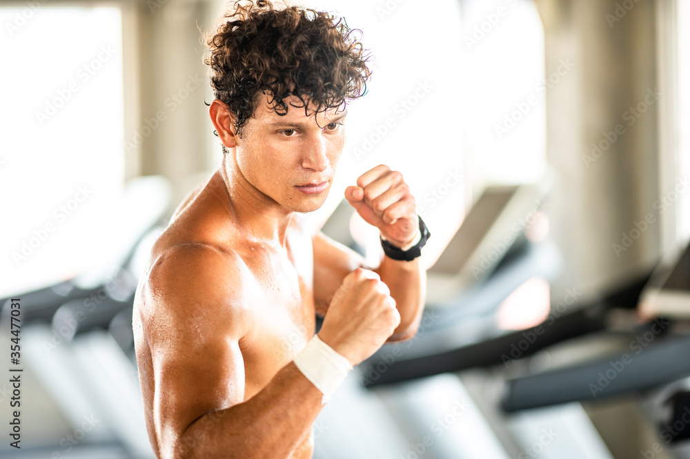 Close Up of a strong muscular young man in sport gym, strong and beautiful muscles that come from exercise and discipline health care, Bodybuilding Close Up of a strong muscular young man in sport gym, strong and beautiful muscles that come from exercise and discipline health care, Bodybuilding