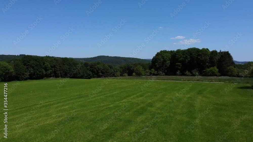 Ascending aerial view of beautiful landscape forest and blue sky Ascending aerial view of beautiful landscape forest and blue sky