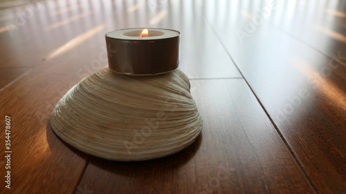 candles on a wooden hardwood floor