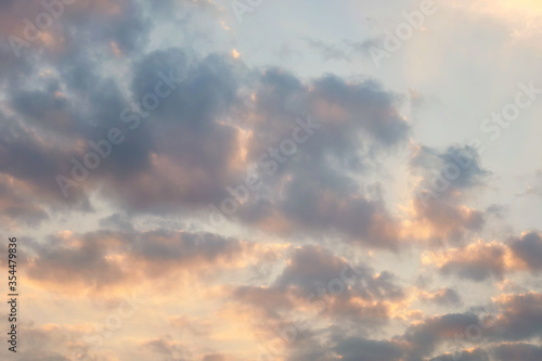 Beautiful sunset sky above clouds with dramatic light