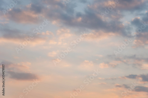 Beautiful sunset sky above clouds with dramatic light © Keopaserth