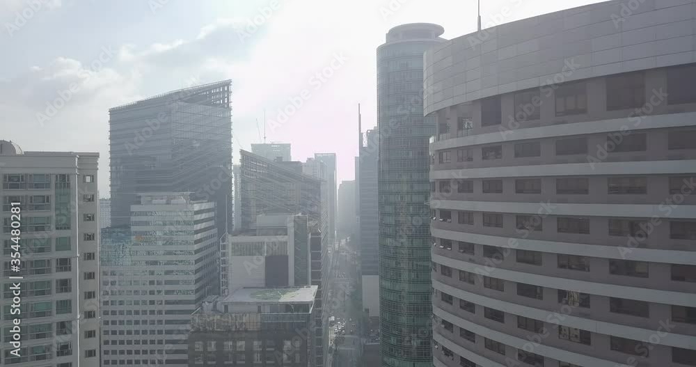 Ungraded, Forward aerial flight alongside high rise buildings towards metropolitan city centre. Drone, 4K.
Ungraded, Forward aerial flight alongside high rise buildings towards metropolitan city centre. Drone, 4K.