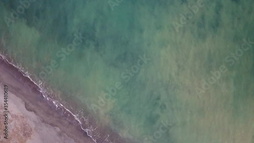 Top Down Aerial View of Tropical Beach and Turquoise Ocean Water. Playa Matapalo, Costa Rica photo