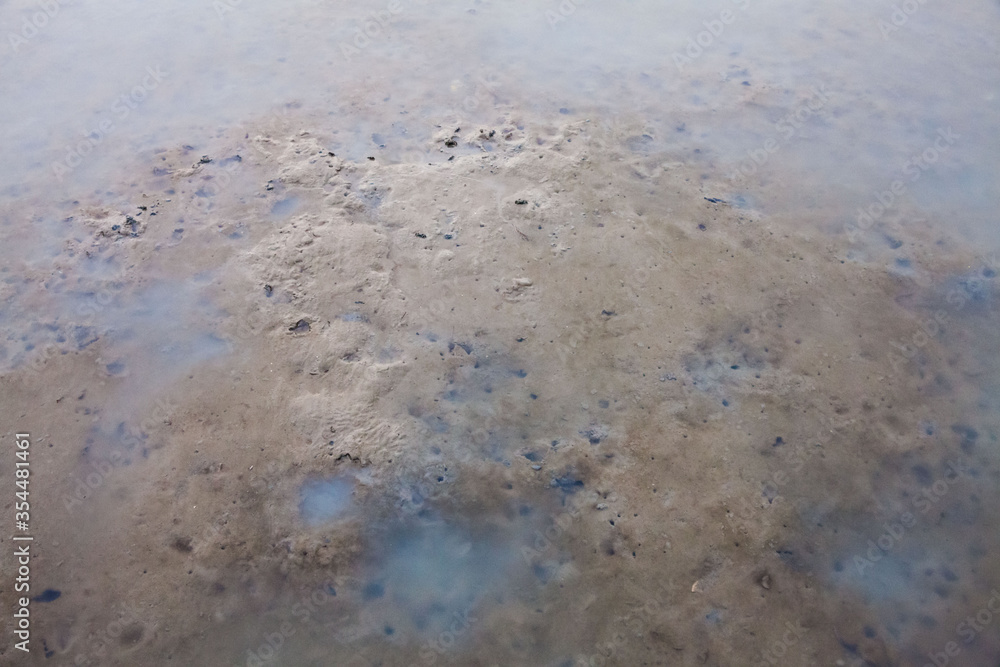 
View of blurry mud texture used for clay mask in beauty products