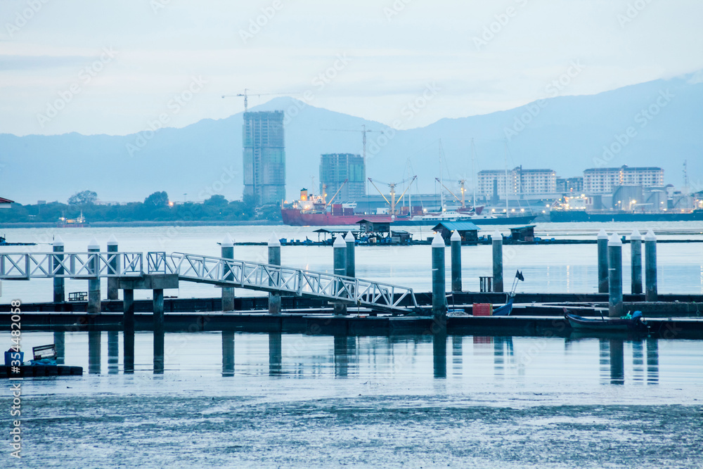 Fishermen port view during blue hour in Penang, Malaysia Fishermen port view during blue hour in Penang, Malaysia