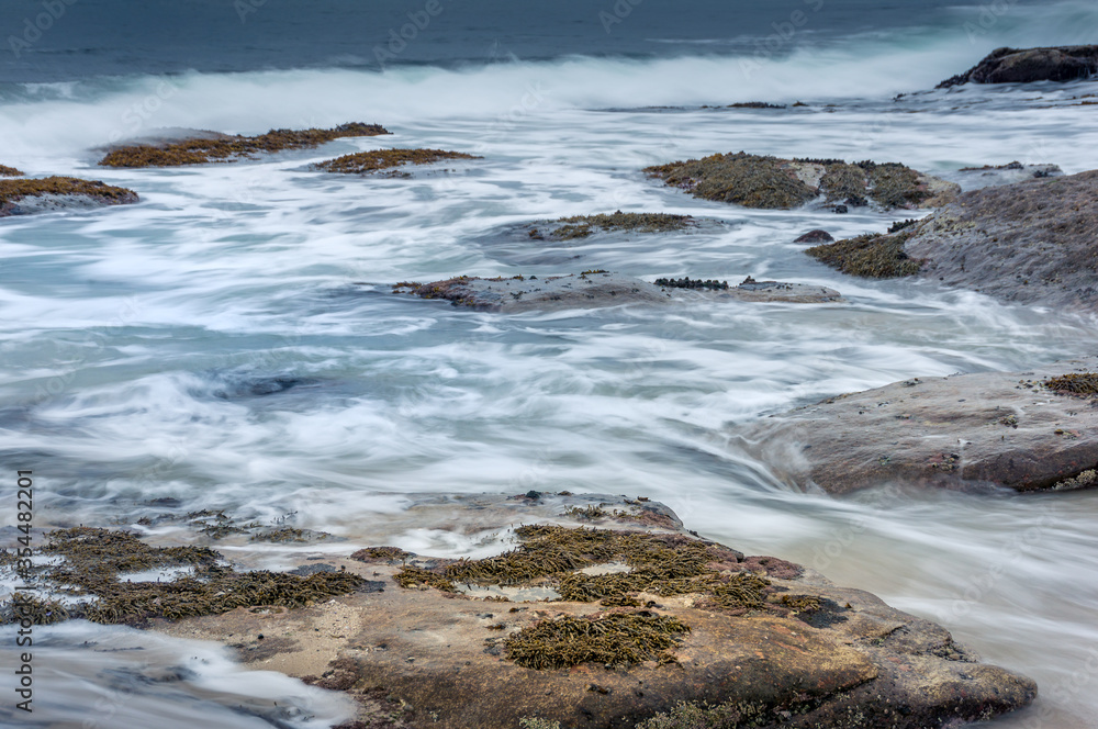 Abstract water texture of swirling ocean waves. Long exposure Abstract water texture of swirling ocean waves. Long exposure