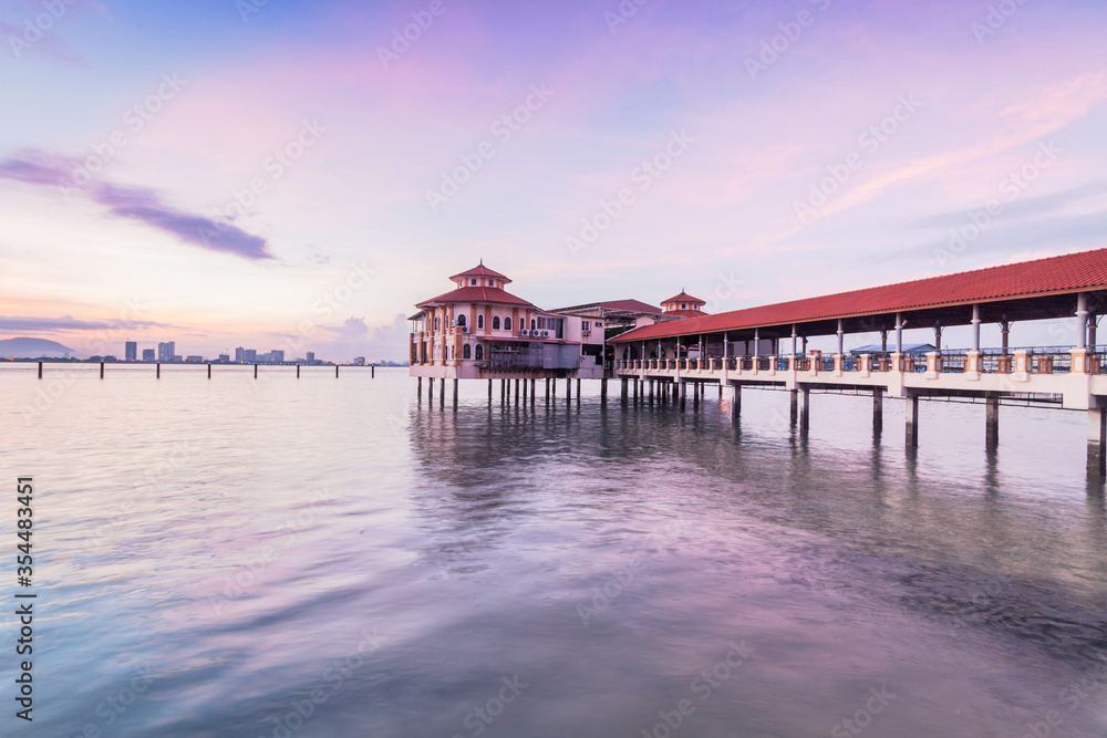 Naklejka premium Sunrise view in George Town Penang with jetty background