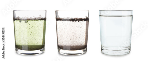 Glasses with clean and dirty water on white background