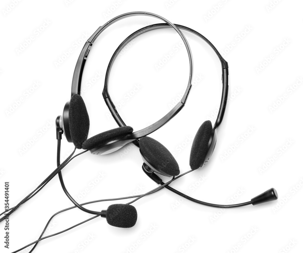 Modern headsets on white background Modern headsets on white background