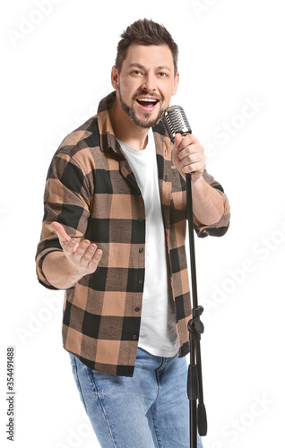 Handsome man singing agains...