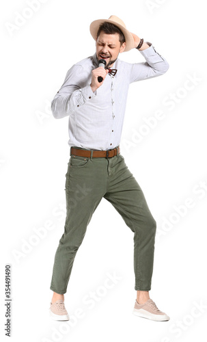 Handsome man singing agains...
