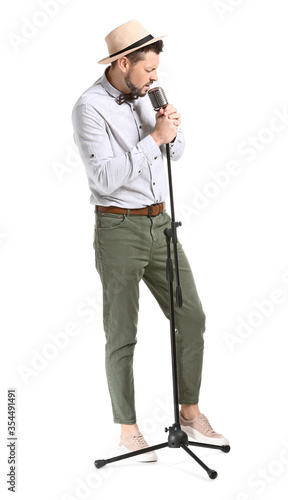 Handsome man singing agains...