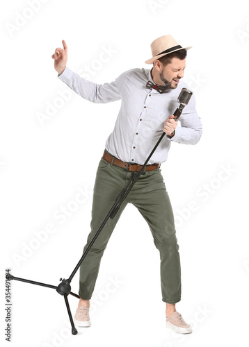 Handsome man singing agains...