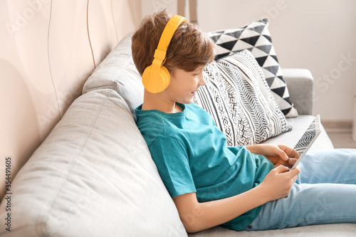 Cute little boy with tablet...