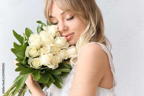 Beautiful young woman with ...
