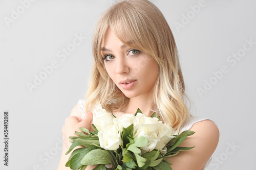 Beautiful young woman with ...