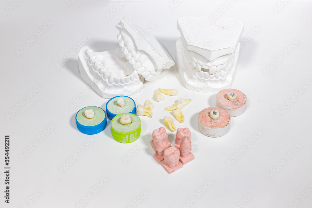 Teeth model blocks are teeth blocks made of cement for use in a dental