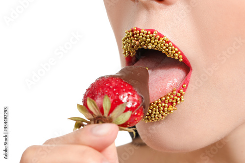 Sexy young woman with straw...